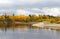 Autumn noon in the Siberian taiga, view from the river