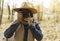 Autumn outdoor portrait of beautiful black photographer