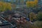 Autumn panorama of the city with a view of the residential quarters and the temple of Serafim Sarovsky under construction.