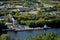 Autumn panorama overlooking a limestone mining plant and a loaded barge from the height of Mount Lysaya.