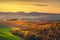 Autumn, panorama in Tuscany, rolling hills, woods and fields on