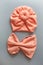 Autumn peach children headband or turban and scarf on gray background.