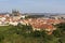 Autumn Prague City with gothic Castle and the colorful Nature with Trees from the Hill Petrin, Czech Republic