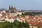 Autumn Prague City with gothic Castle and the colorful Nature with Trees from the Hill Petrin, Czech Republic