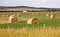 Autumn prairie and straw piles