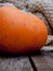 Autumn Pumpkin Thanksgiving Background concept - orange pumpkins over wooden table macro