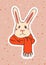 Autumn rabbit with orange scarf on pink background in cartoon style