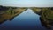 Autumn river in Europe, flying over the water surface