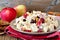 Autumn salad with chicken, apples, nuts, cranberries in yogurt dressing