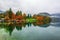 Autumn scenery of colorful trees reflected in lake water