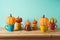 Autumn season concept with pumpkin decor and cofee cups on wooden table. Halloween or Thanksgiving greeting card