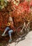 Autumn simple pleasures. Active leisure and lifestyle. Girl ride bicycle for fun. Blonde enjoy relax park. Autumn