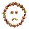 Autumn smiley. Sign is laid out of acorns