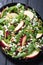 Autumn spinach salad with apple , cheese , walnut and dried cranberry