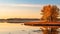 Autumn Splendor: Serene Wetland With Vibrant Colors Reflecting On Calm Water