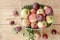 Autumn still life with apples, plums, autumn leaves.