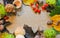 Autumn still life chestnut, mushroom, acorn, leaves on wood back