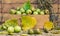 Autumn still life composition: pears, fallen autumn yellow leaves and oats grain