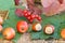 Autumn still life with fruits of hawthorn, hazelnuts, branch of