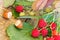 Autumn still life with hazelnuts, branch of raspberries, green a