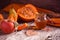 Autumn still life. Honey, ginger pumpkin and apples on an old rough cracked background. Healthy simple seasonal autumn food.