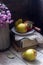 Autumn still life with pears, apple, chrysanthemums and books. Rustic style.