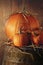 Autumn still life with pumpkins on barrel