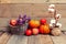 Autumn still life with pumpkins, vegetables and cotton on a wood