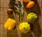 Autumn still life - small spotted squash, asparagus beans, purple Basil, paprika, yellow and chocolate tomatoes on bamboo Mat