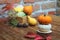 Autumn still life on the theme of the harvest of small different pumpkins.