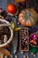 Autumn still life on a wooden table top view. Pumpkin, chestnuts, acorns, quince, nuts, cones. Rustic background. Quince and pear