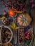 Autumn still life on a wooden table top view. Pumpkin, chestnuts, acorns, quince, nuts, cones. Rustic background. Quince and pear