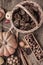 Autumn still life on a wooden table top view. Pumpkin, chestnuts, acorns, quince, nuts, cones. Rustic background. Quince and pear