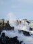 An autumn storm rages in the baltic sea, hitting the waves against a breakwater