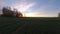 Autumn sunrise above wheat field, time lapse