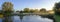 Autumn sunrise with mist on the Eel House traps on the River Test near Longstock, Hampshire, UK