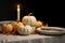 Autumn Table Setting With Mini White Pumpkins, Plates, And Candles