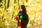 Autumn teenage girl. Portrait of beautiful young teen girl walking outdoors in autumn.