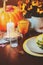 autumn traditional table setting for Thanksgiving or Halloween