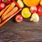 Autumn vegetables Thanksgiving harvest, raw healthy organic food on wooden background