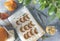 Autumn vegetarian food recipe. Baked mini pumpkin with  herbs, and honey on a wooden board over grey table top view