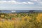 Autumn view from 1530 foot high Cadillac Mountain with views of the Porcupine Islands, Frenchman Bay and Holland America cruise sh