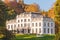 Autumn view of the historic Sonsbeek villa with visitors in Arnhem