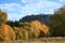 Autumn view on peak Stolowe Mountains from Pasterka village in Poland. Szczeliniec