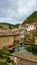 Autumn view of small stone city in the heart of Umbria, called `village of streams` or `little Venice` for the torrent