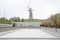 Autumn view of the square of heroes and the sculpture