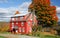 Autumn village house in New England town with bright color in sunny day