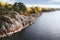 Autumn in Vyborg bay, aero view of clean nordic nature. Beautiful rocks and cliffs with woods in North Europe, Baltic sea, gulf of