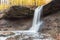 Autumn Waterfall flowing into Gorge