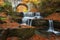 Autumn waterfalls near Sitovo, Plovdiv, Bulgaria. Beautiful cascades of water with fallen yellow leaves.